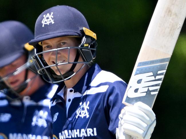 BRISBANE, AUSTRALIA - OCTOBER 12: Meg Lanning of Victoria celebrates after scoring a half century during the WNCL match between Queensland and Victoria at Peter Burge Oval, on October 12, 2023, in Brisbane, Australia. (Photo by Bradley Kanaris/Getty Images)