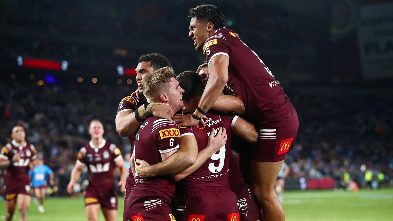 It was all Queensland after the Walsh hit. Photo: NRL Photos / Brett Costello