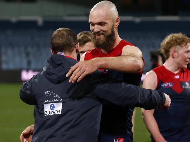 Demons coach Simon Goodwin embraces his skipper Max Gawn after the epic win. (Photo by Michael Klein)