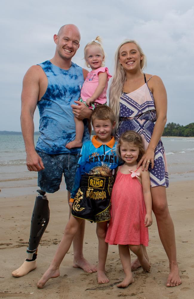 Glenn Dickson, 27, with his wife Jessie-lee, 25, and their children Reef, 5, Lylah, 3 and  Aurora, 18 months at Mission Beach. Picture: Marc McCormack