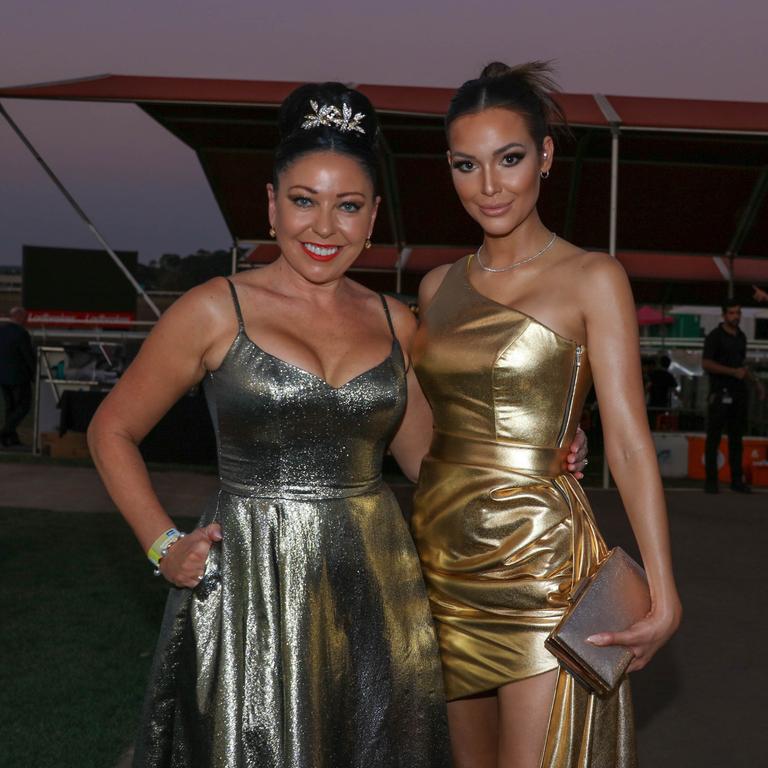 Michelle and Amy-Lee Dixon at the Darwin Turf Club Gala Ball. Picture: Glenn Campbell