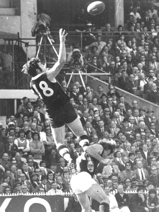 Kevin Neale takes a hanger against the Blues in 1972.