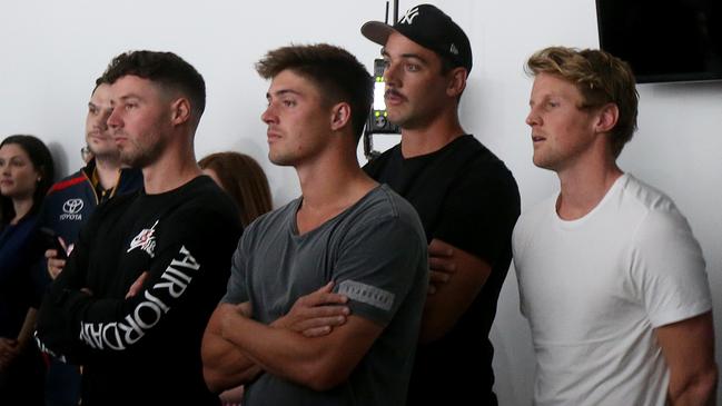 Crows players Luke Brown, Riley Knight, Taylor Walker and Rory Sloane look on during new coach Matthew Nicks’ first press conference. Picture: AAP Image/Kelly Barnes