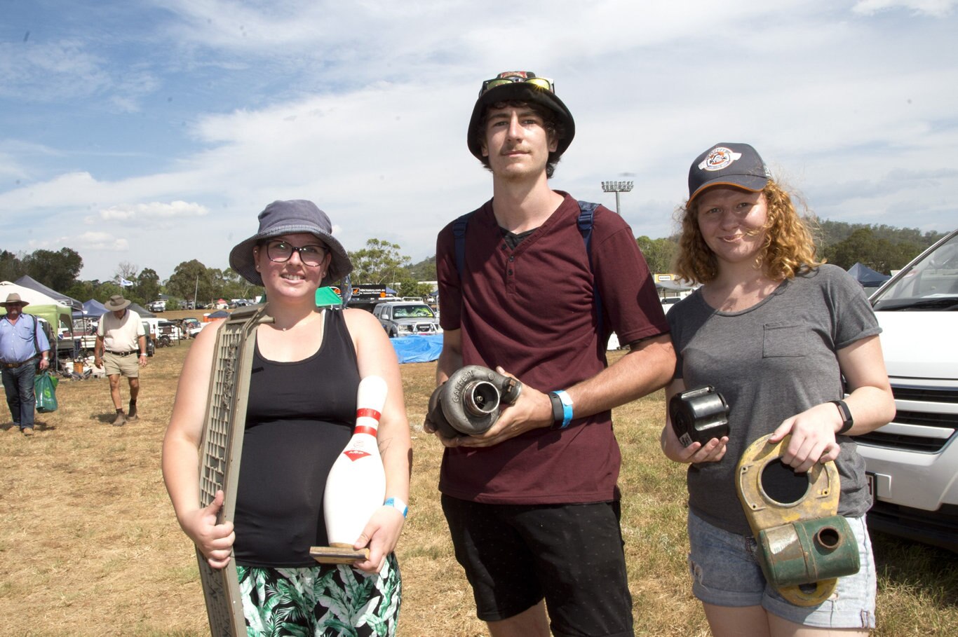 Finding bargains at Swap Meet are from left; Emma Ford, Ben Sznajder and Krystal Daves. Amongst the great finds were a bowling pin, a tubor for lawn mower and a victor mower cover. Swap Meet at Showgrounds. February 2019. Picture: Bev Lacey