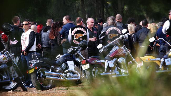 Bandidos and Hells Angels bikies line up with fellow mourners at the funeral of Anthony Zervas.