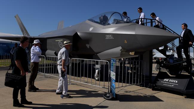 Visitors look at the F-35 Joint Strike Fighter jet at the Avalon Airshow 2017 in Melbourne on Tuesday. Picture: AAP