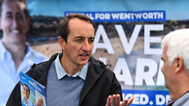 Mr Sharma speaking with a voter at Bondi during the campaign. Picture: AFP