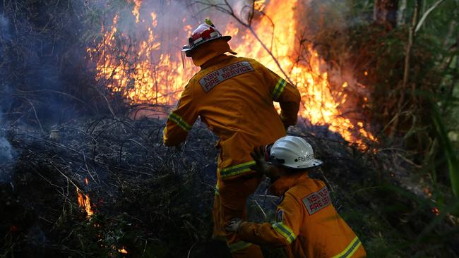 A NSW Rural Fire Service Strike team during a controlled back burn at Cudlee Creek in 2019. Picture Dylan Coker