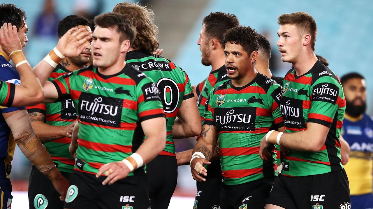 The Rabbitohs celebrate a try to Dane Gagai.