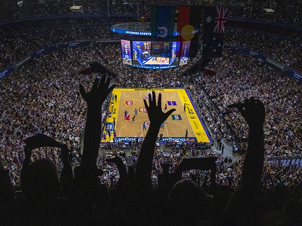 SYDNEY, AUSTRALIA - MARCH 10: Fans cheer as the Kings score during game three of the NBL Grand Final series between Sydney Kings and New Zealand Breakers at Qudos Bank Arena, on March 10, 2023, in Sydney, Australia. (Photo by Jenny Evans/Getty Images)