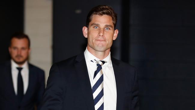 Tom Hawkins leaving the tribunal after his suspension was upheld.