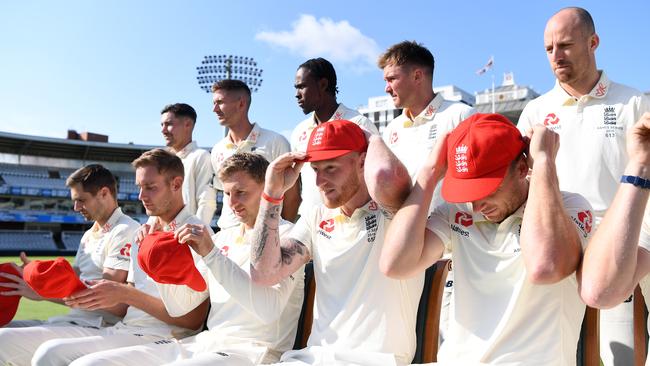 The England team wear red caps in support of the Ruth Strauss Foundation at Lord's Cricket Ground