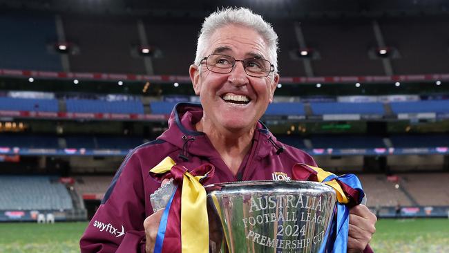 MELBOURNE , AUSTRALIA. SEPTEMBER 28, 2024. AFL Grand Final between the Sydney Swans and the Brisbane Lions at the MCG. Chris Fagan coach of the Brisbane Lions on the empty MCG with the cup. Picture: Mark Stewart