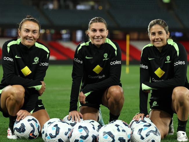 Arsenal trio (from left) Caitlin Foord, Steph Catley and Kyra Cooney-Cross are all smiles in Matildas camp. Picture: Robert Cianflone/Getty Images
