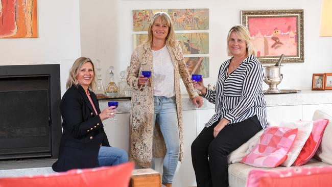 Bayside ladies Dee Spring, Felicity Frederico and Felicity Jones each raise a glass of Champagne to celebrate Global Champagne Day. Picture: Penny Stephens