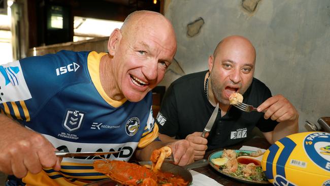 Eels legend Peter Wynn and 317 Restaurant owner Pierre Sande, who was hoping the return of the NRL would boost trade on Church St. Picture: Angelo Velardo