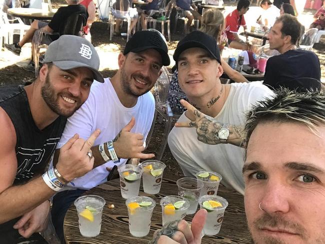 Sam Fisher, Harlan Camilleri, Dustin Martin and Dane Swan at the Austin City Limits Music Festival during an AFL off-season.