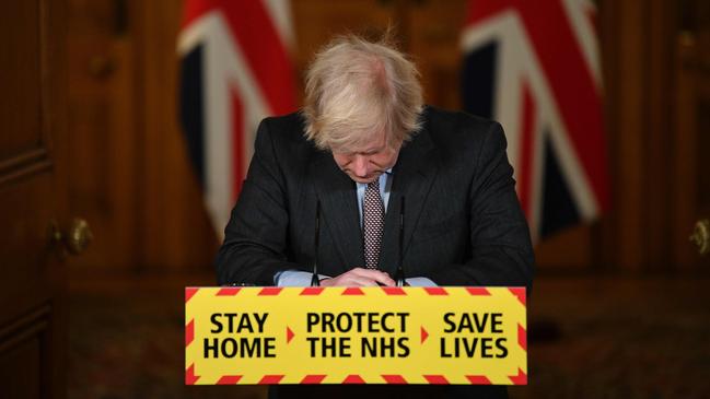 ‘I am deeply sorry for every life that has been lost’: Boris Johnson at Downing Street on Tuesday night. Picture: AFP