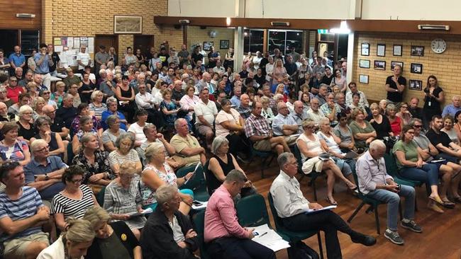 A packed meeting of residents attending a forum to discuss the Gold Coast City Council's City Plan, organised by Bonney MP Sam O'Connor (pictured far right).