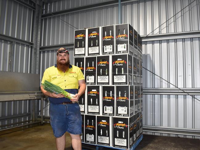 Operations Manager Karl Schulte with produce from Maragi Farms that is about to head into supermarkets for Christmas. Photo: Hugh Suffell.