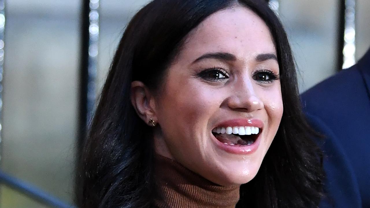 The Duchess grinned and laughed as she met with staff at Canada House. Picture: Daniel Leal-Olivas/Getty Images