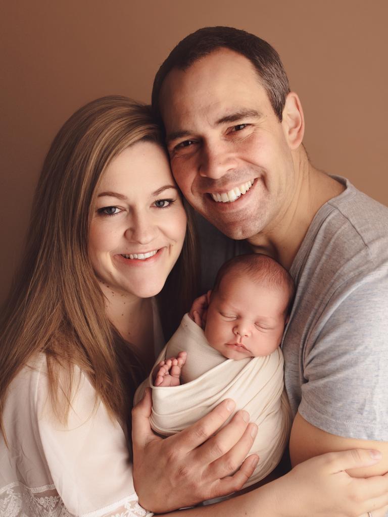 Brenton Ragless with wife Hayley and son, James — born last November. Picture: Natasha Megan Photography