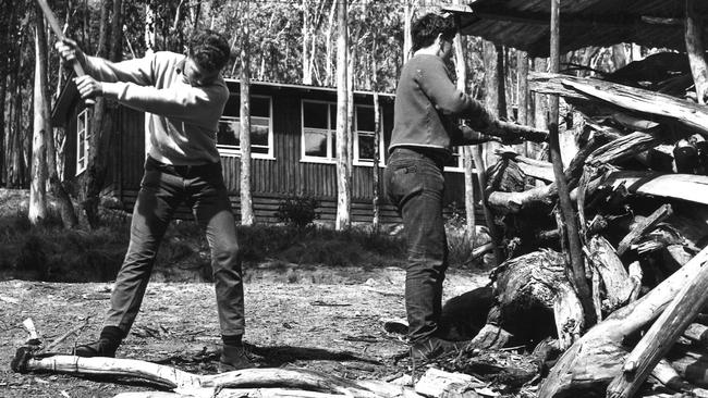 Students did chores like chopping wood at Timbertop, which aimed to make men out of boys. Picture: Geelong Grammar School.