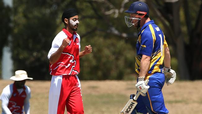 Melton’s Jaskirat Singh celebrates the wicket of Taylors Lakes’ Chris Marron Saturday. Picture: Hamish Blair