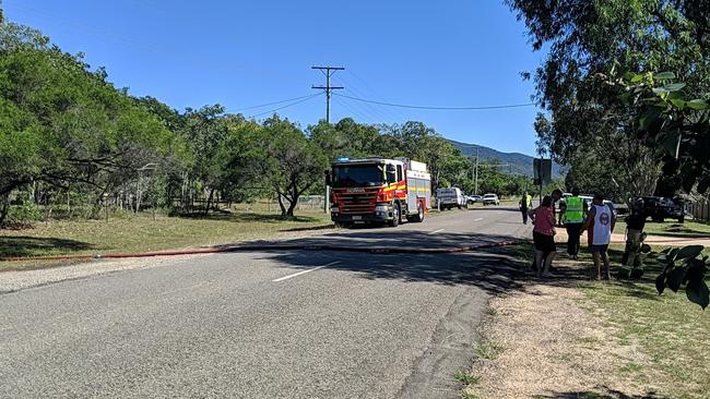 Firefighters at the scene of a house fire on Mystic Ave, Balgal Beach. Photo: Matt Taylor