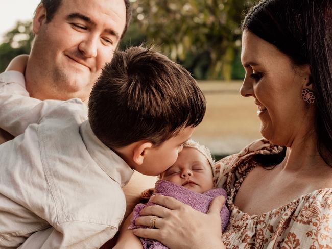 Samantha and Gene Campbell with Georgie and son Hugh a week before her heart surgery. Photo: Contributed