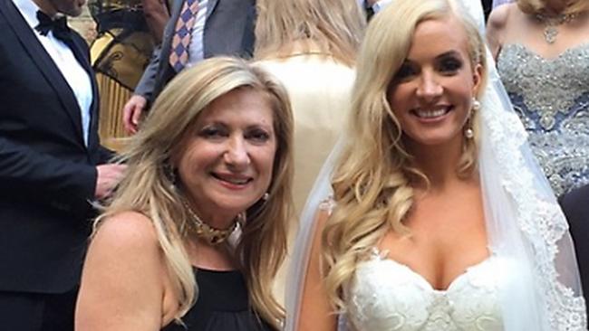 BIG DAY: Recruitment millionaire and political donor Sarina Russo with Angelique Boyce (above) on her wedding day in 2015. The wedding was attended by Ms Ley.