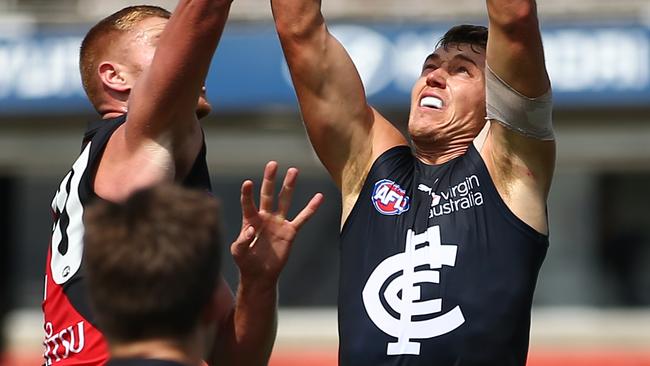 Patrick Cripps Peter Wright contest the footy during the pre-season clash. Picture: Getty Images