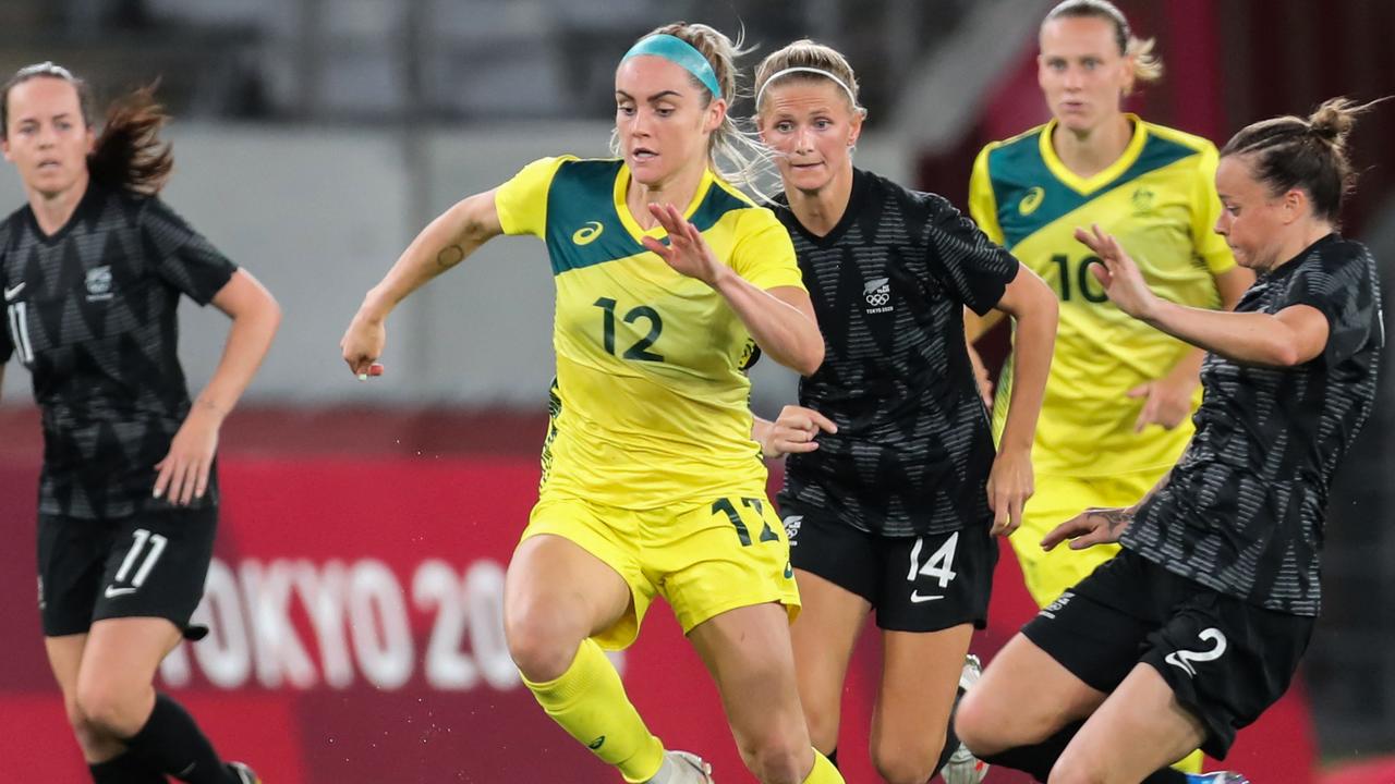 Australia's defender Ellie Carpenter (C) has received a massive boost in the FIFA 22 ratings.