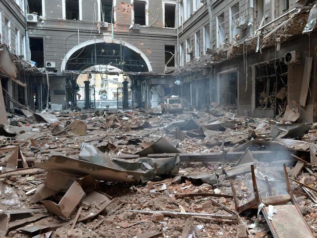 Damage in a building entrance after the shelling by Russian forces of Constitution Square in Kharkiv. Picture: AFP