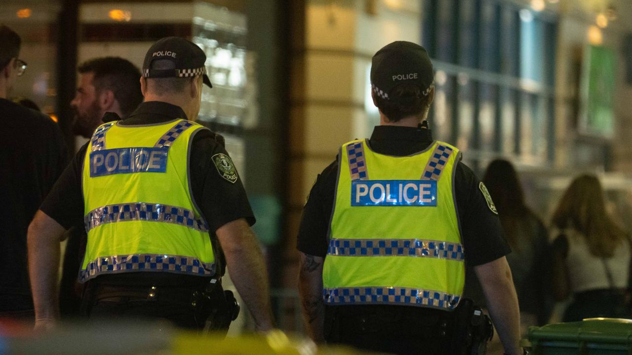 Police on Hindley Street on a Friday night. Picture: Morgan Sette