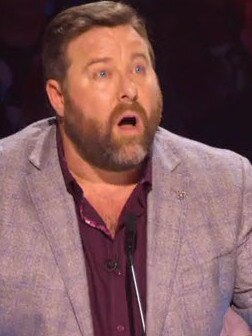 Shane Jacobson looks on in horror.