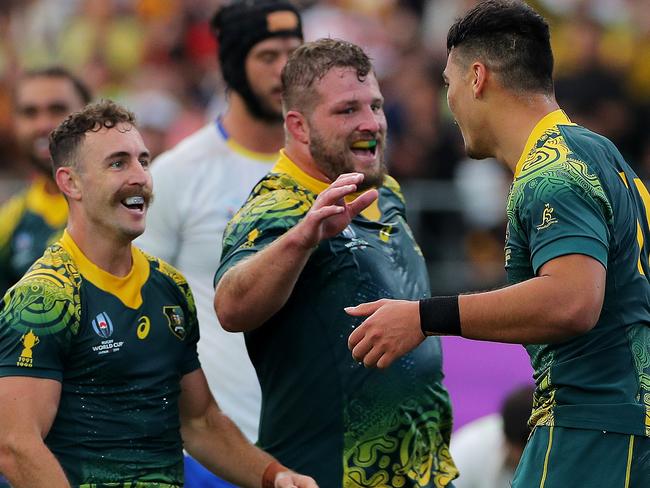 OITA, JAPAN - OCTOBER 05: Jordan Petaia (R) of Australia celebrates scoring his side's second try with his team mates during the Rugby World Cup 2019 Group D game between Australia and Uruguay at Oita Stadium on October 05, 2019 in Oita, Japan. (Photo by Koki Nagahama/Getty Images)