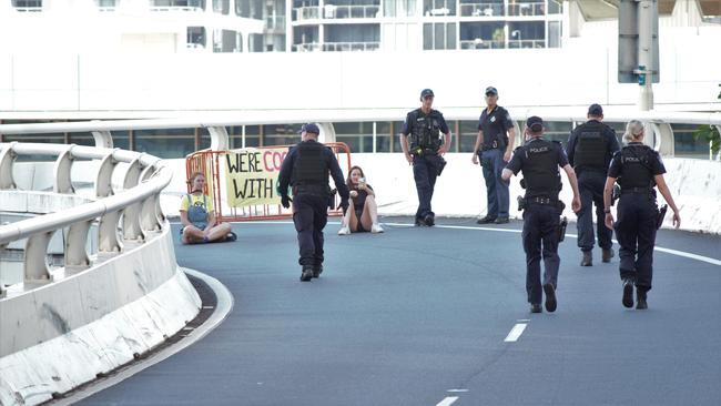 Two women have been arrested following a protest on the Turbot St on-ramp.