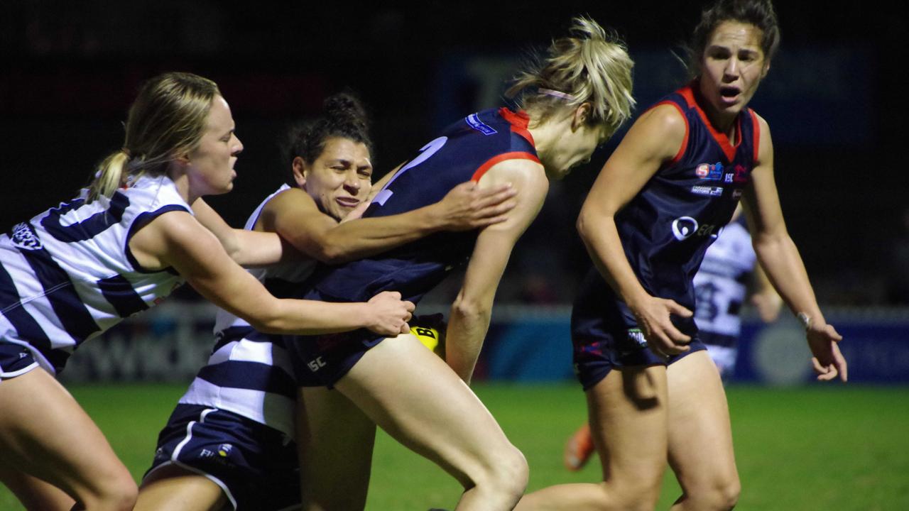 South Adelaide's Czenya Cavouras (front) tackles Norwood's Monique Hollick during their SANFLW semi-final clash at Norwood Oval. Picture: John Emery