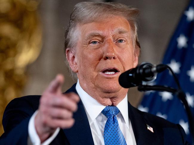 PALM BEACH, FLORIDA - DECEMBER 16: U.S. President-elect Donald Trump speaks at a news conference at Trump's Mar-a-Lago resort on December 16, 2024 in Palm Beach, Florida. In a news conference that went over an hour, Trump announced that SoftBank will invest over $100 billion in projects in the United States including 100,000 artificial intelligence related jobs and then took questions on Syria, Israel, Ukraine, the economy, cabinet picks, and many other topics.   Andrew Harnik/Getty Images/AFP (Photo by Andrew Harnik / GETTY IMAGES NORTH AMERICA / Getty Images via AFP)