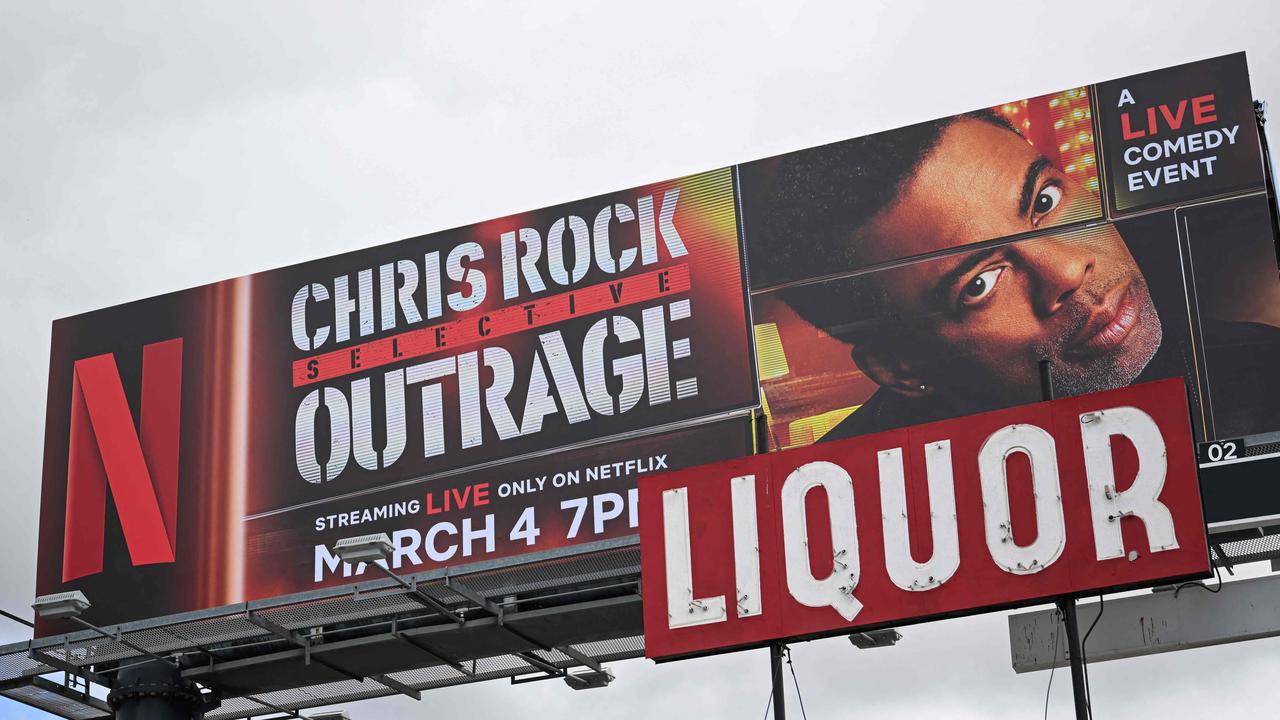 A billboard advertises the Netflix special Chris Rock: Selective Outrage along Sunset Blvd on February 28, 2023 in Los Angeles, California. (Photo by Patrick T. Fallon / AFP)