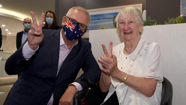 Prime Minster Scott Morrison gestures alongside aged care resident Jane Malysiak before they receive their second and final COVID-19 vaccination shot at the Castle Hill Medical Centre, in Sydney. Picture: NCA NewsWire / Bianca De Marchi