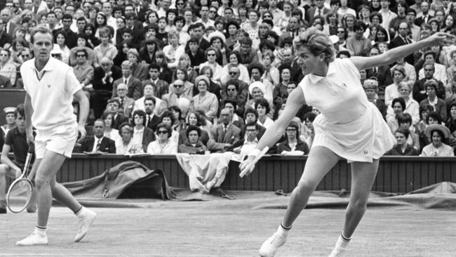 1965. Ken Fletcher and Margaret Court playing mixed doubles at Wimbledon in 1965