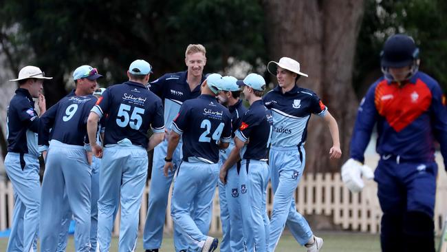 Tom Pinson of Sutherland celebrates a wicket in the match against Mosman.