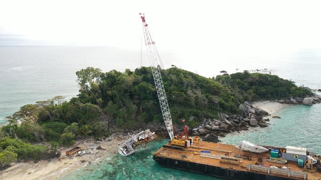 A wrecked boat being removed by authorities. Picture: QLD Government