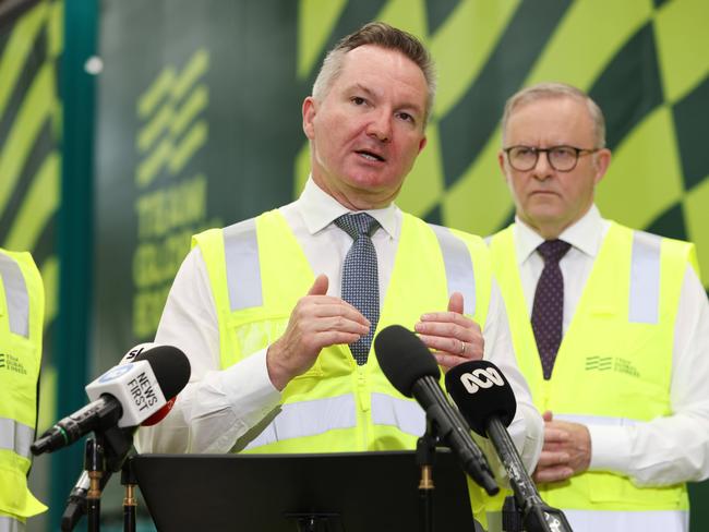 Chris Bowen and Anthony Albanese dressed in mad yellow fluoro. Picture: Damian Shaw