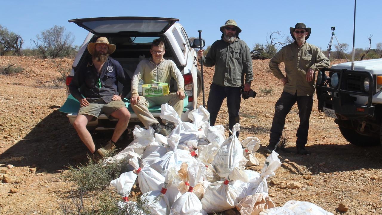 Flinders University palaeontologists at Pwerte Marnte Marnte fossil site. Pictured from left to right: Sam Arman, Arthur Crichton, Carey Burke and Warren Handley