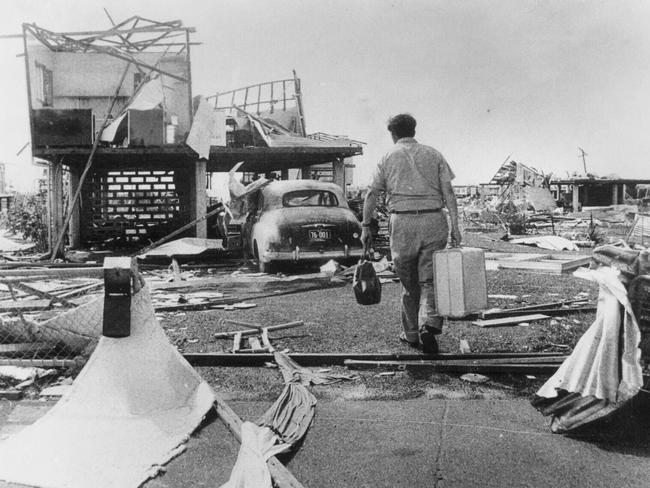 TAUS 60th Anniversary. Cyclone Tracy occurred on Christmas day, 1974 in Darwin. A devastated home-owner returns from holiday to find his home wrecked. Picture Bruce Howard
