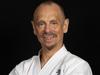 Instructor inspired many after dark past led him to karate