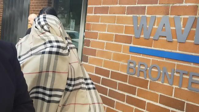 Sonja Christian covered her face with a Burberry-print scarf. Picture: Ashleigh Gleeson